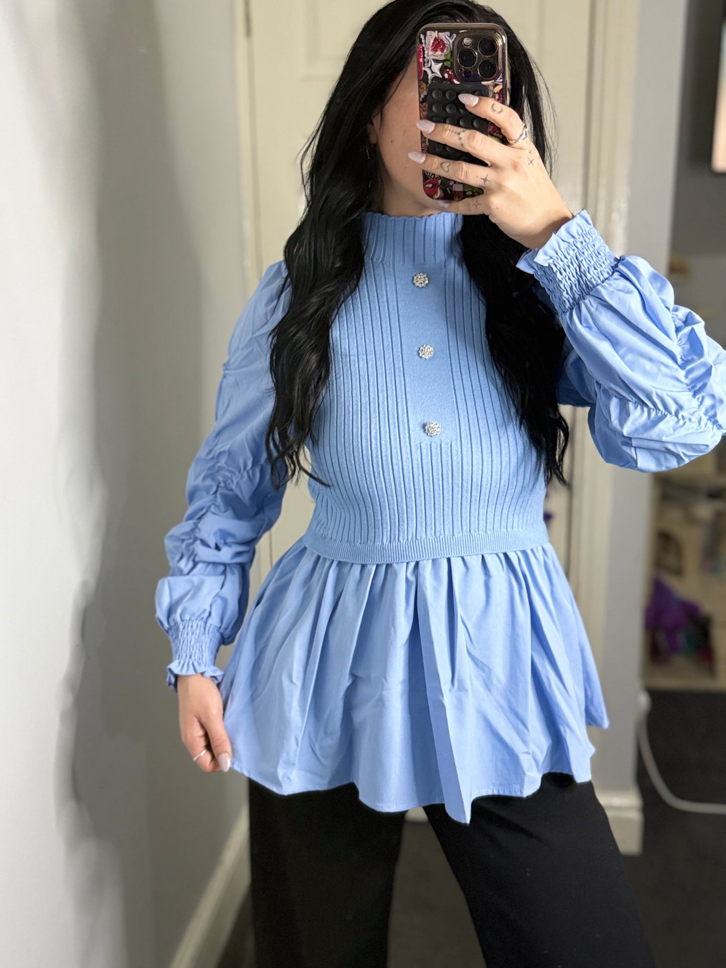 Ribbed knit peplum blouse