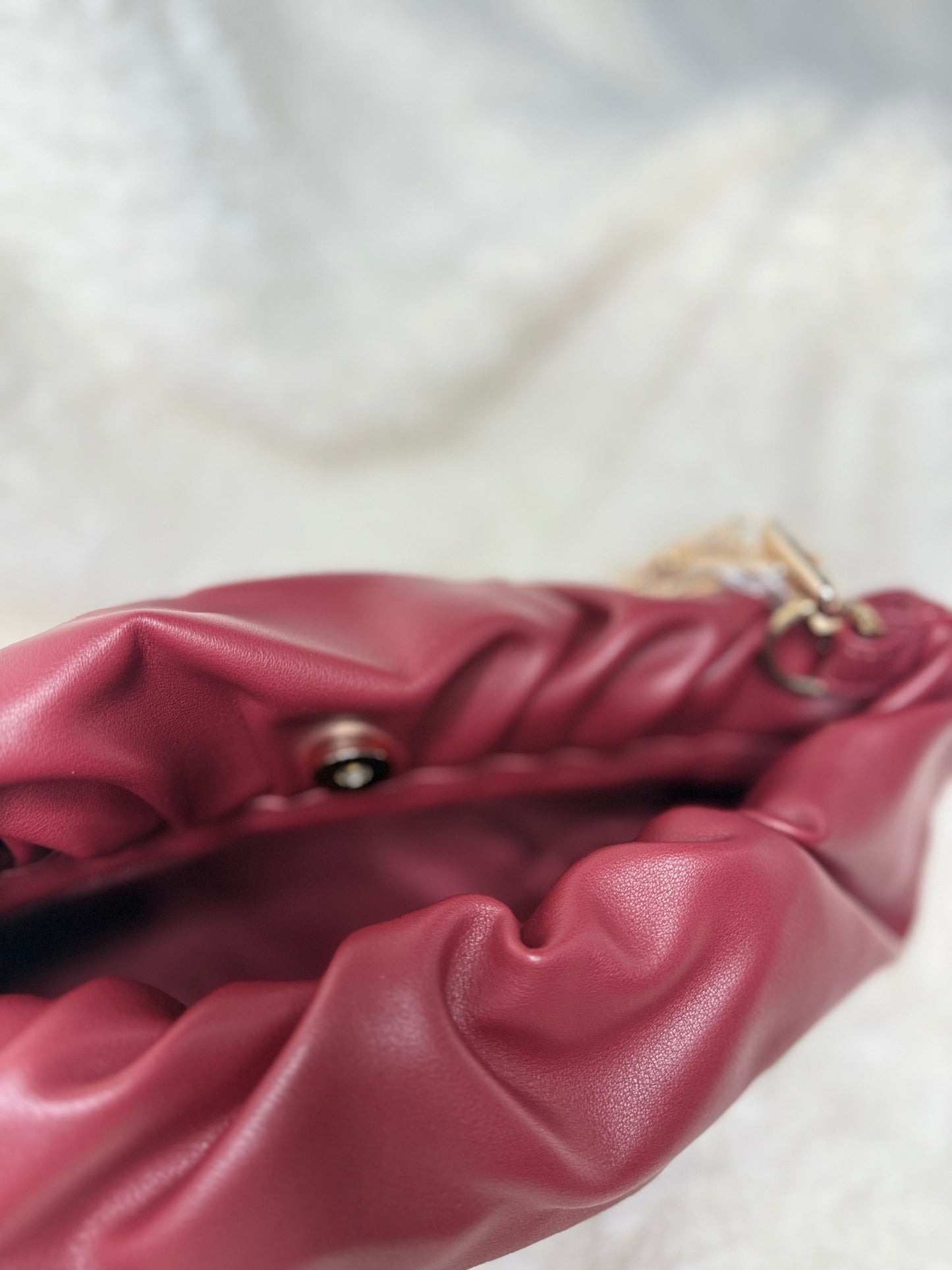 Ruched gold chain bag
