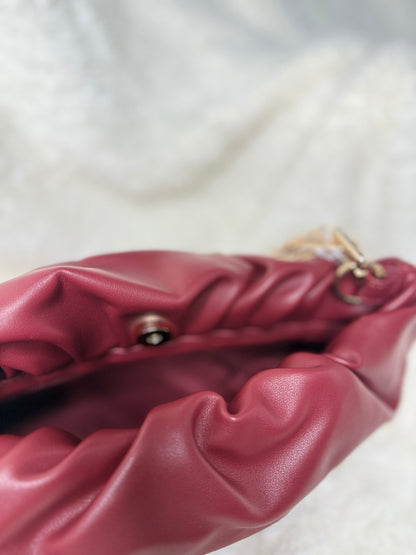 Ruched gold chain bag