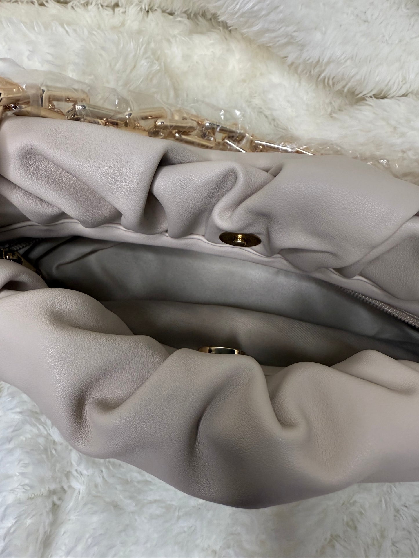 Ruched gold chain bag