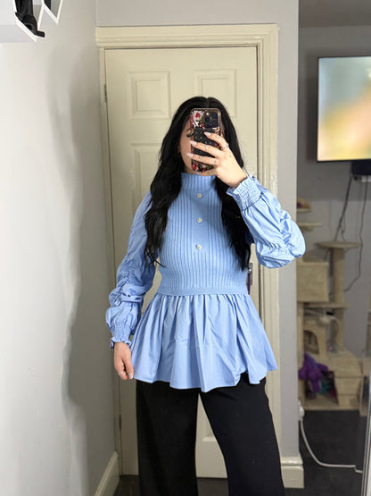 Ribbed knit peplum blouse