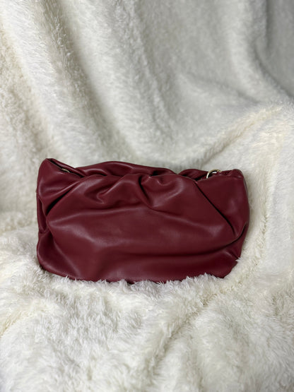 Ruched gold chain bag