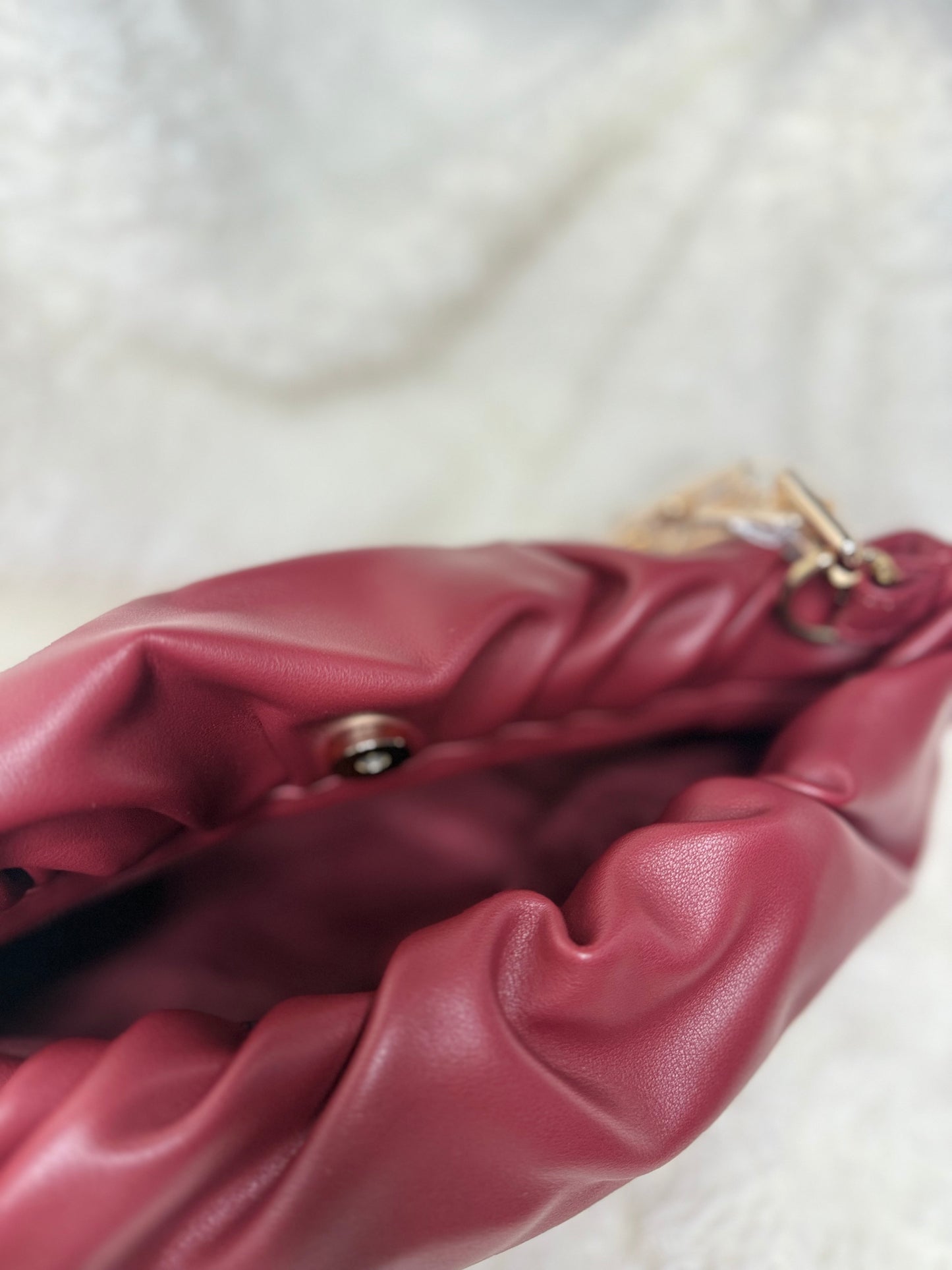 Ruched gold chain bag