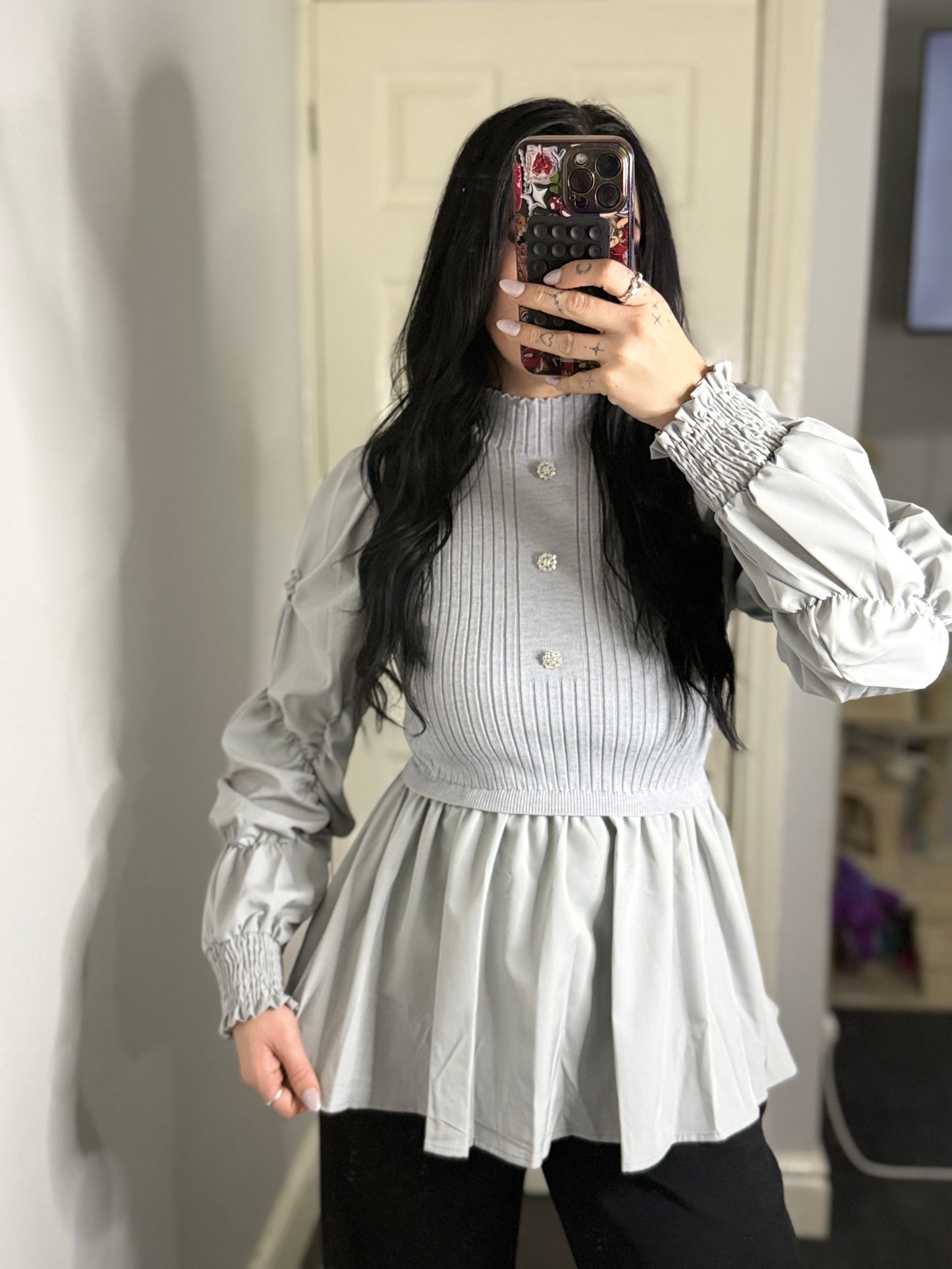 Ribbed knit peplum blouse